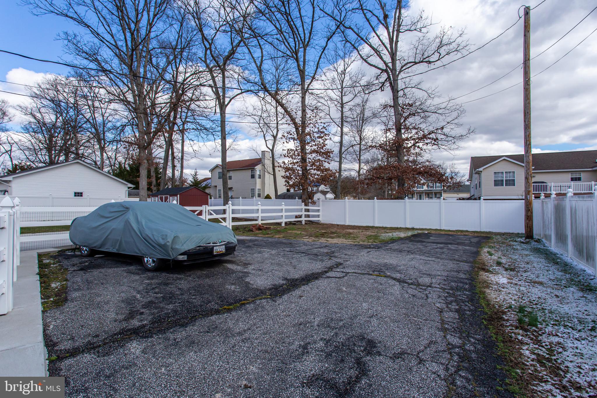 2784 Moran Drive Waldorf, MD 20601 - Photo 21 of 65 a backyard of a house with a yard and garage