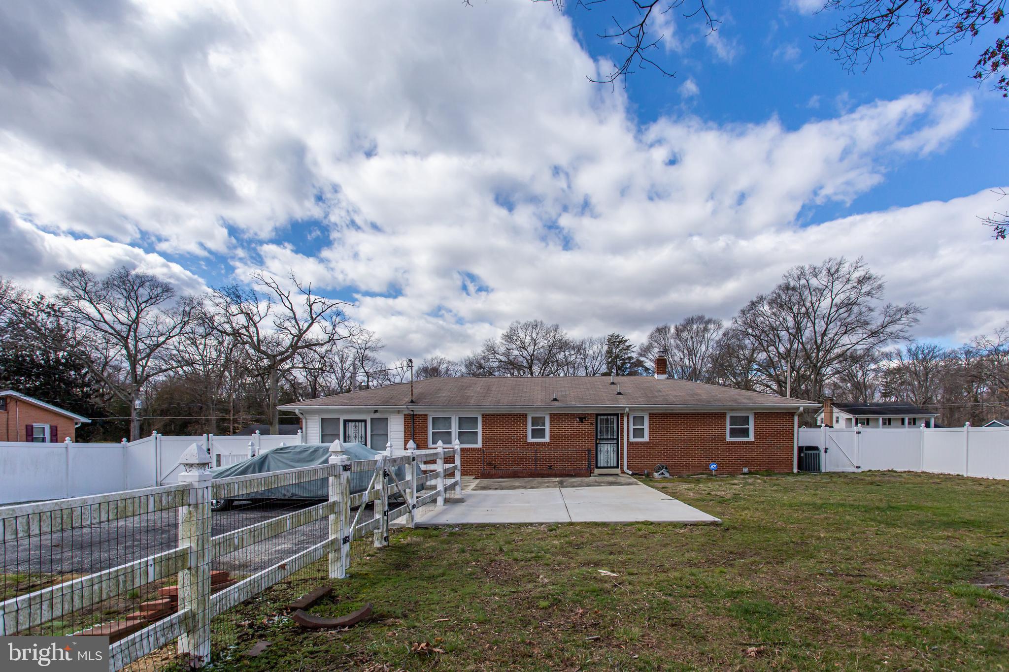 2784 Moran Drive Waldorf, MD 20601 - Photo 32 of 65 a front view of house with yard and trees