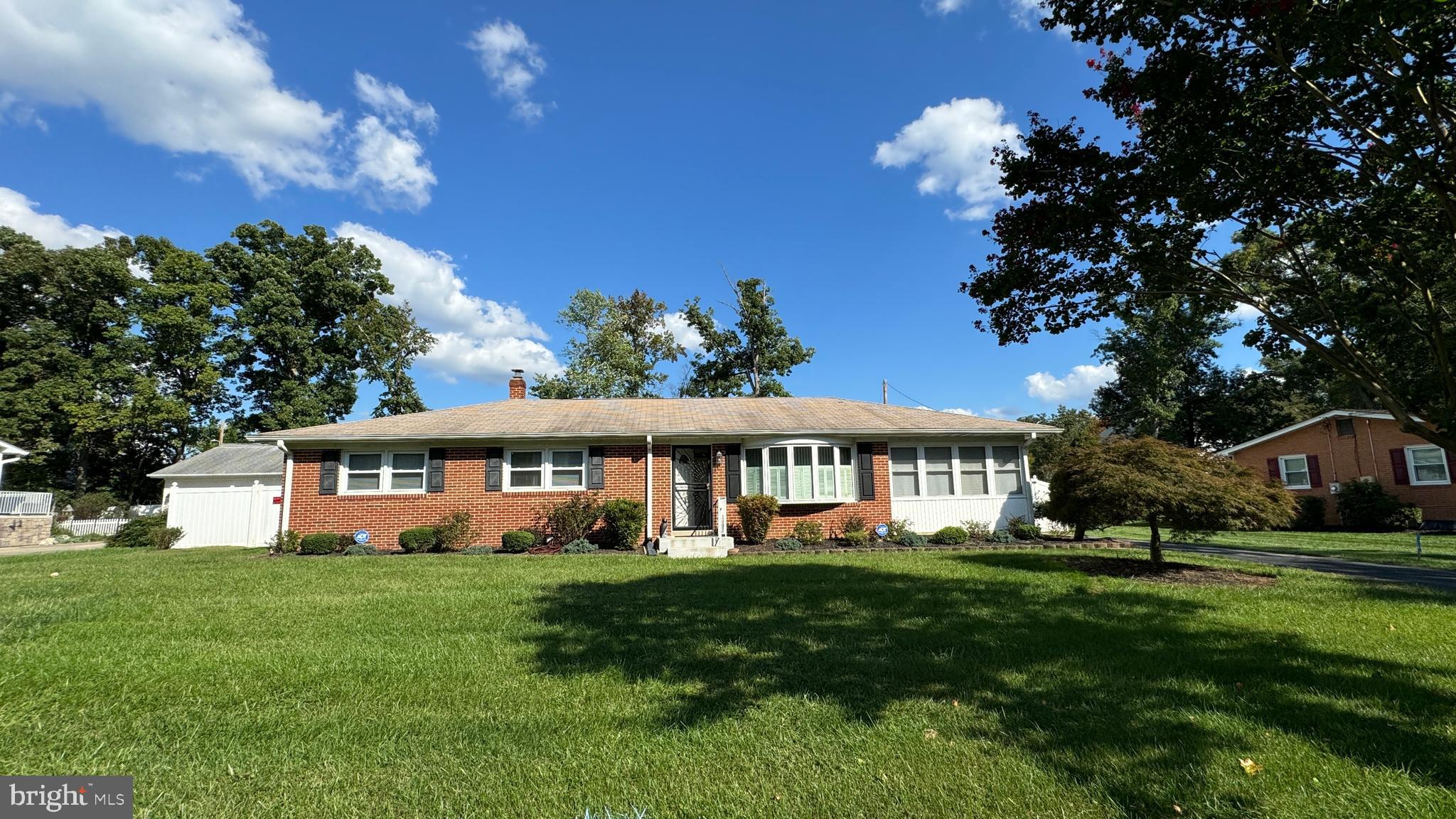 2784 Moran Drive Waldorf, MD 20601 - Photo 43 of 65 a front view of a house with a garden