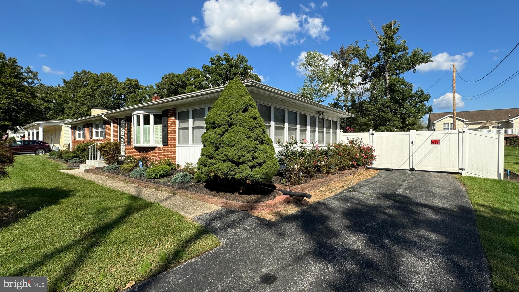 2784 Moran Drive Waldorf, MD 20601 - Photo 44 of 65 a front view of a house with a garden