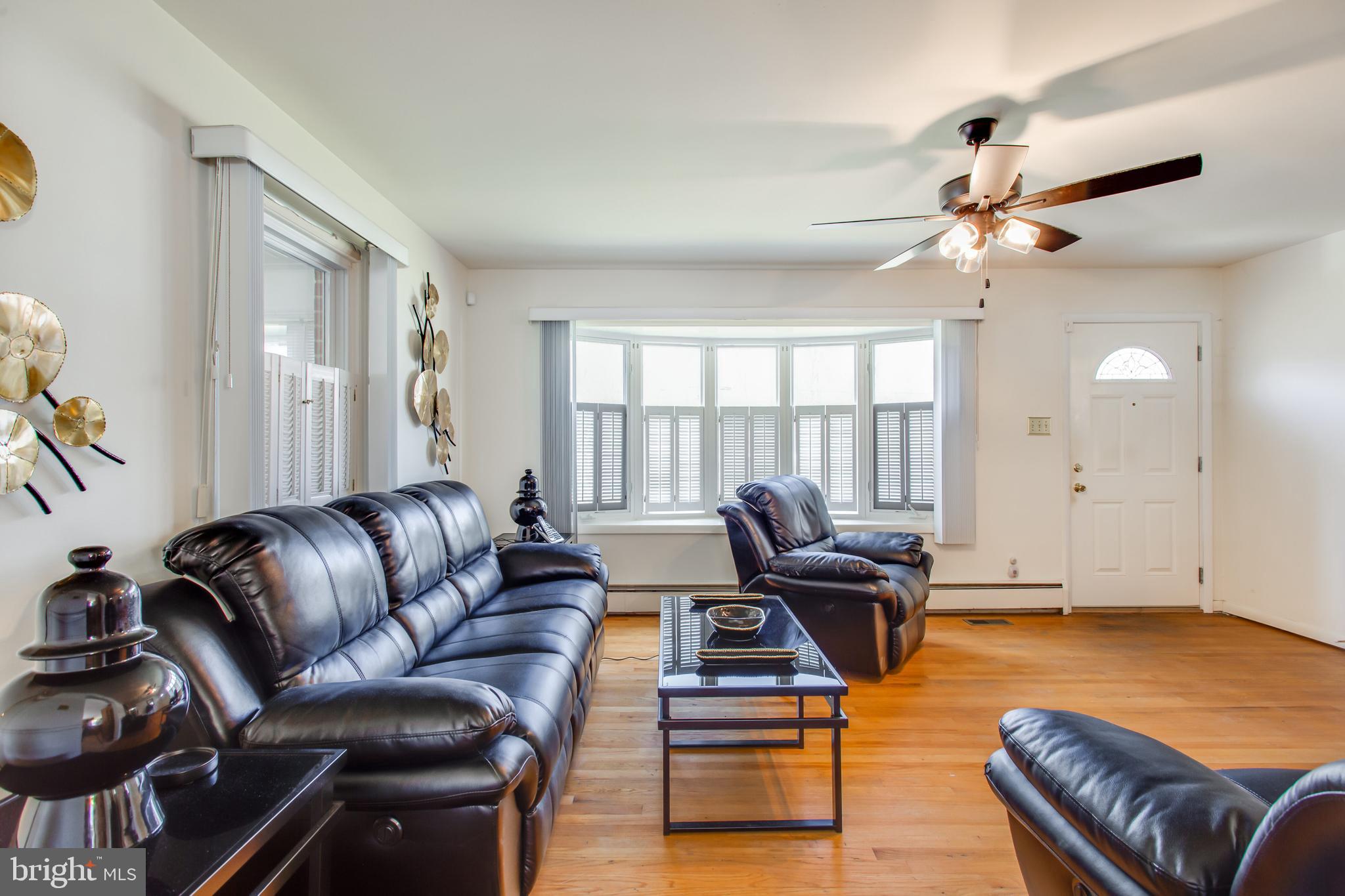 2784 Moran Drive Waldorf, MD 20601 - Photo 10 of 65 a living room with furniture ceiling fan and a window