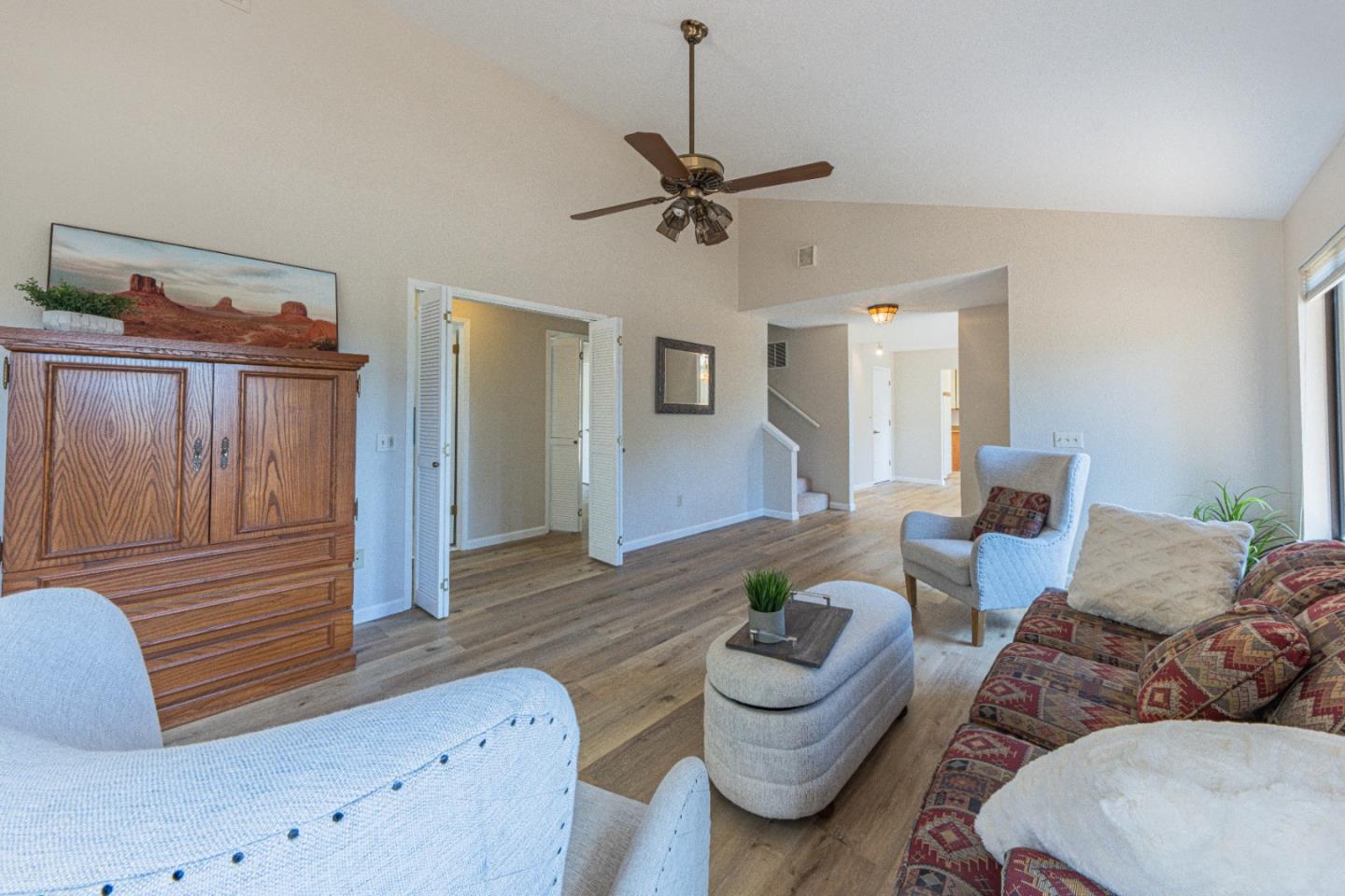 6959 Valle Pacifico Road Salinas, CA 93907 - Photo 12 of 45 a living room with furniture and wooden floor