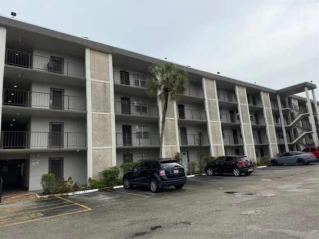 a car parked in front of a building