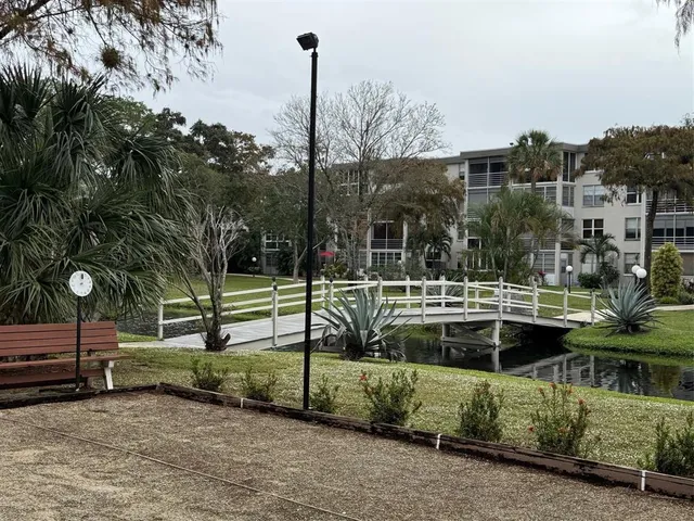 a view of a park with swings