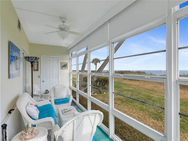 a bathroom with a sink a toilet and shower curtain
