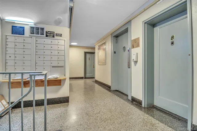 a view of a hallway with front door