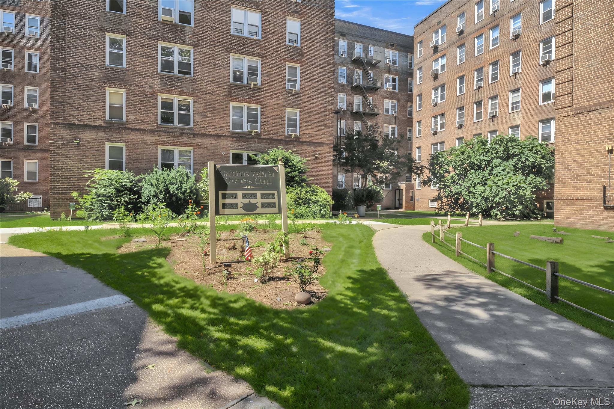 35-40 75th Street, Unit 5B Queens, NY 11372 - Photo 19 of 20 a view of a building with garden