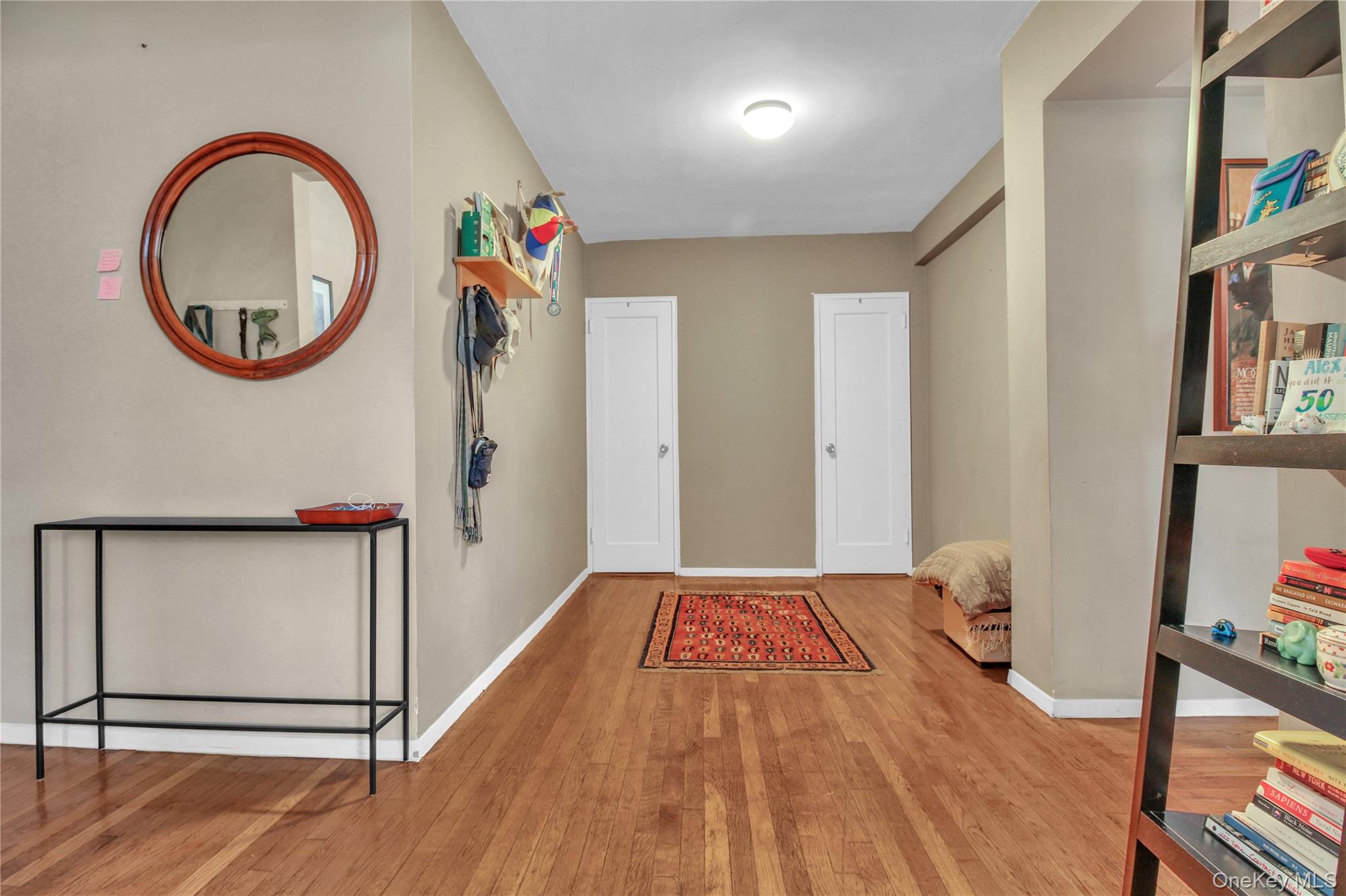 35-40 75th Street, Unit 5B Queens, NY 11372 - Photo 4 of 20 a view of an entryway with wooden floor