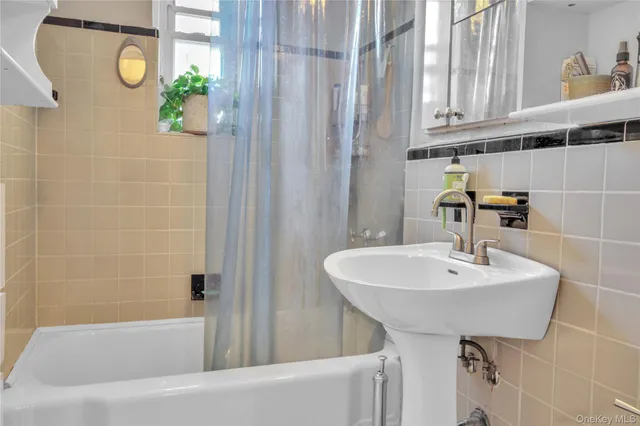 a bathroom with a sink and a bathtub