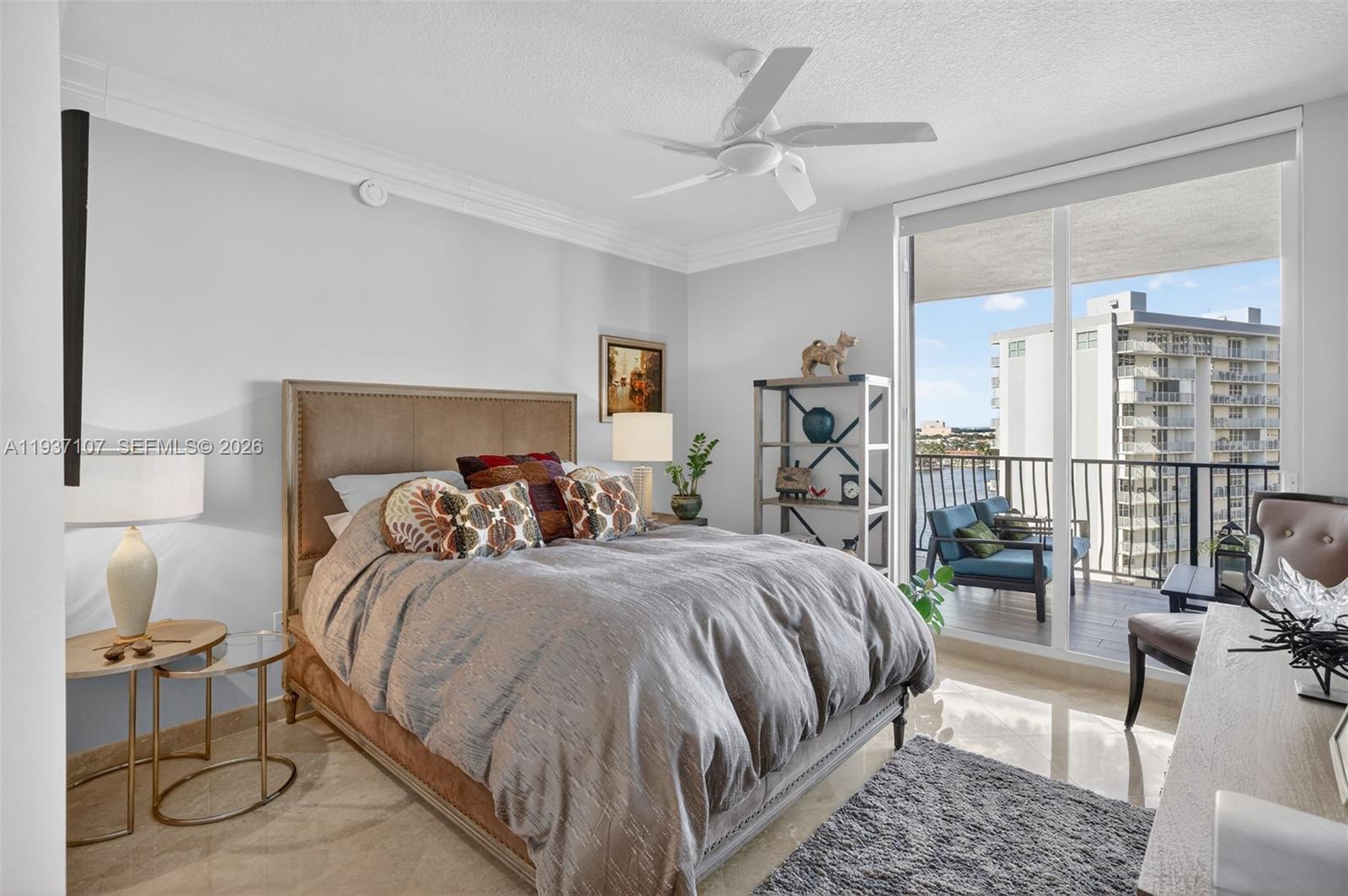 100 South Birch Road, Unit 1103F Fort Lauderdale, FL 33316 - Photo 45 of 80 Guest bedroom (2nd primary bedroom) w/ sliders off to the balcony and intracoastal views & motorized window roller shade.