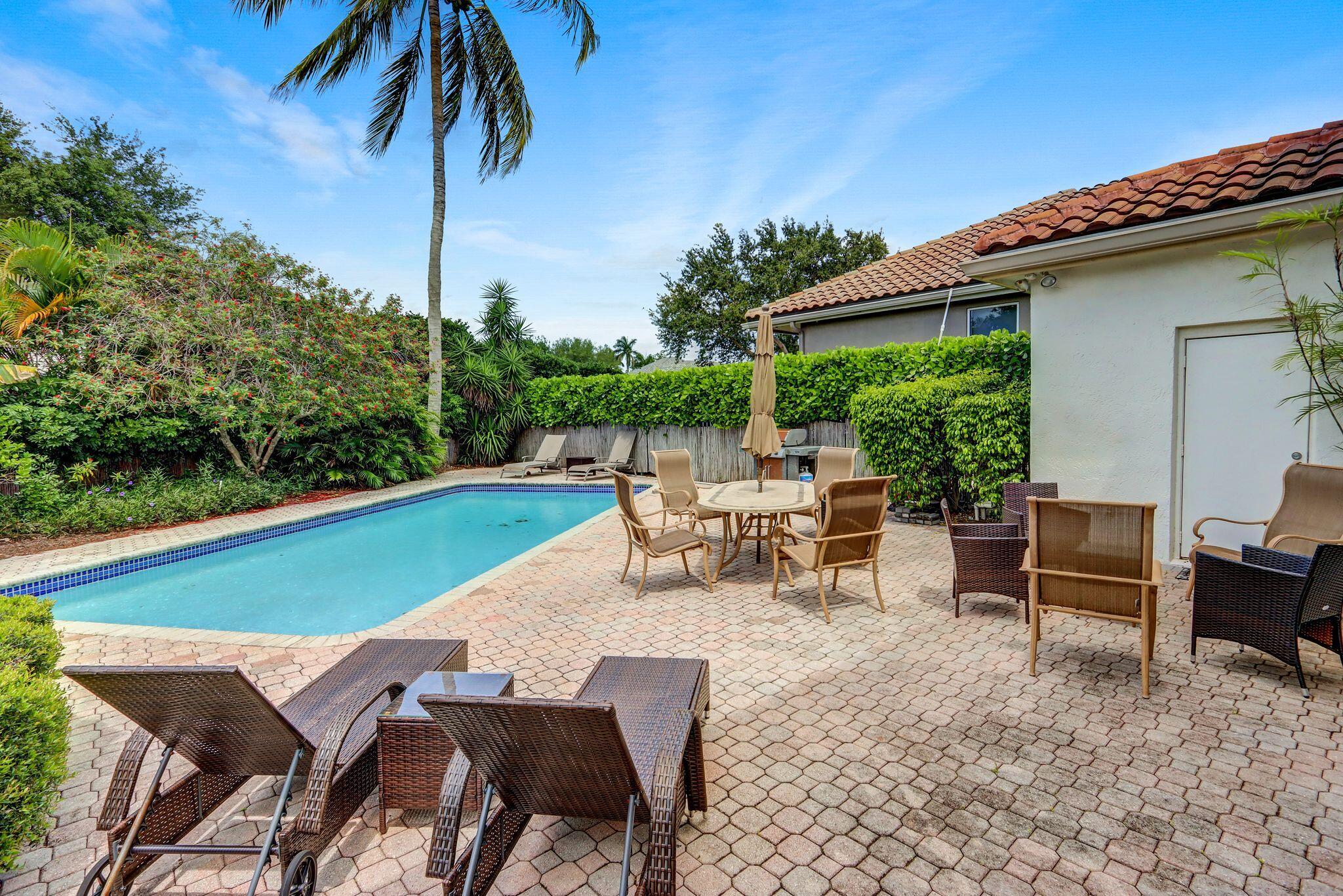 4075 Northwest 58th Lane Boca Raton, FL 33496 - Photo 22 of 24 Patio - Pool - 1
