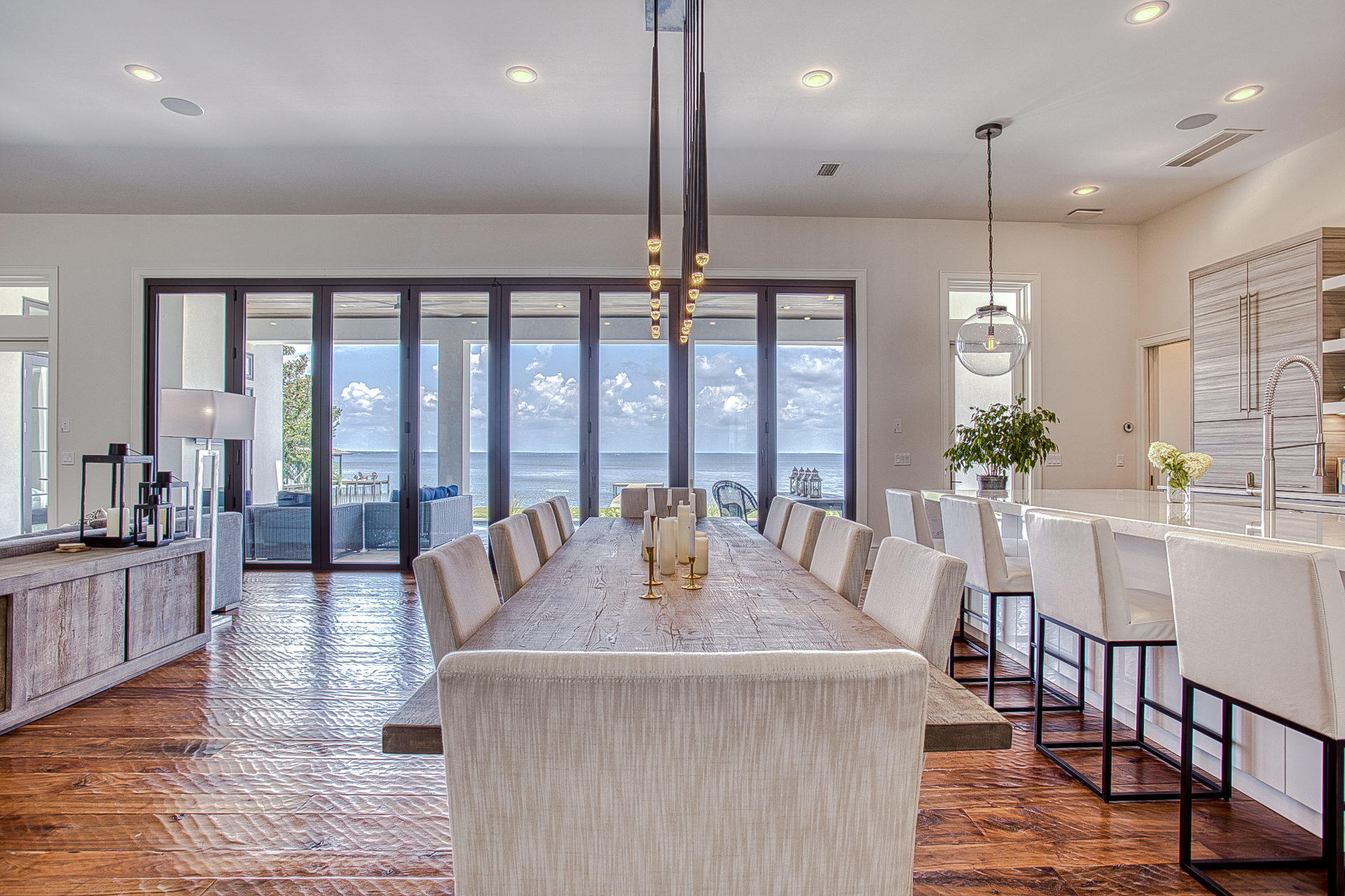 1023 Driftwood Point Road Santa Rosa Beach, FL 32459 - Photo 12 of 38 a view of a dining room with furniture window and wooden floor
