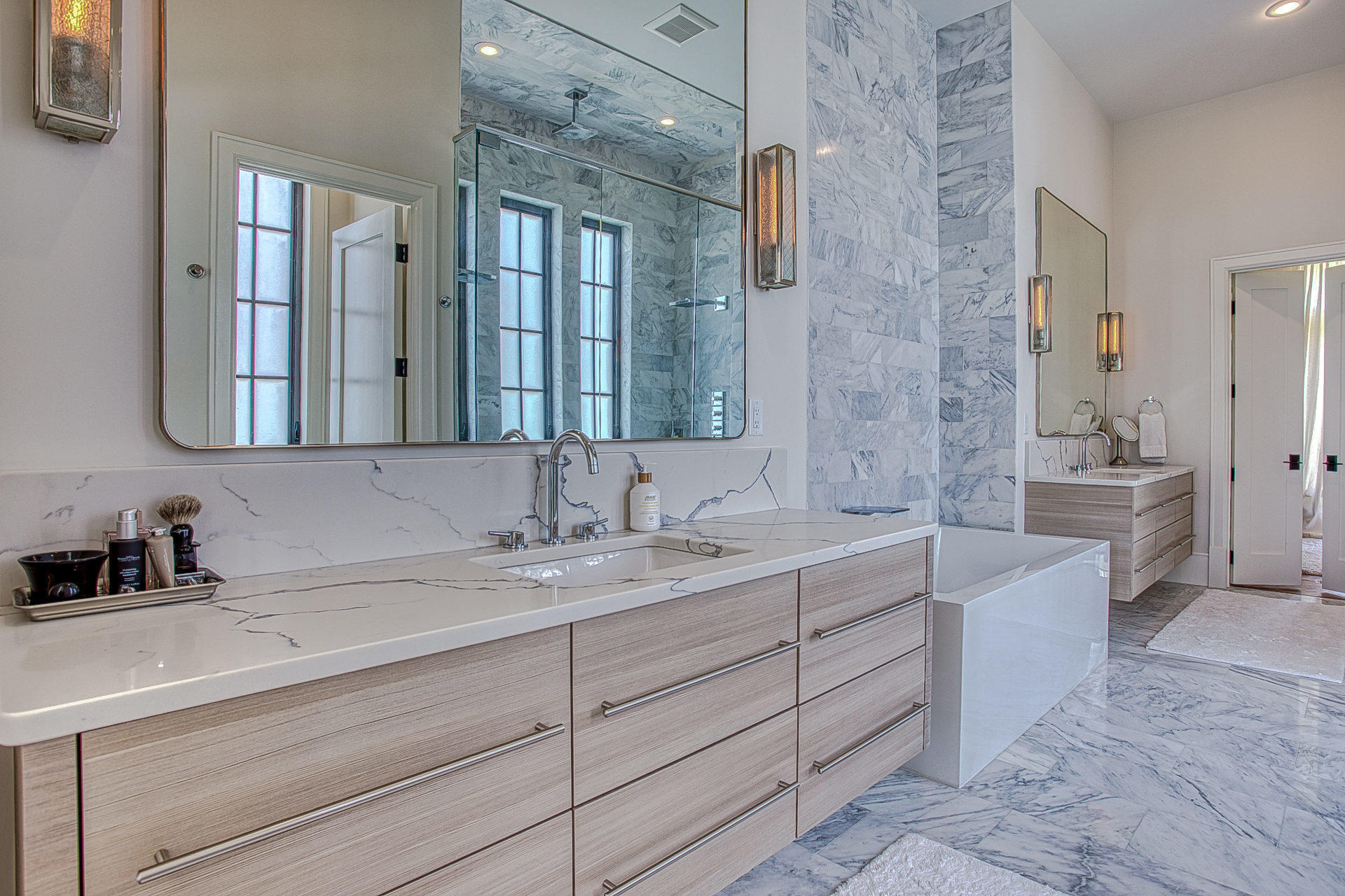 1023 Driftwood Point Road Santa Rosa Beach, FL 32459 - Photo 23 of 38 a bathroom with a double vanity sink mirror and bathtub