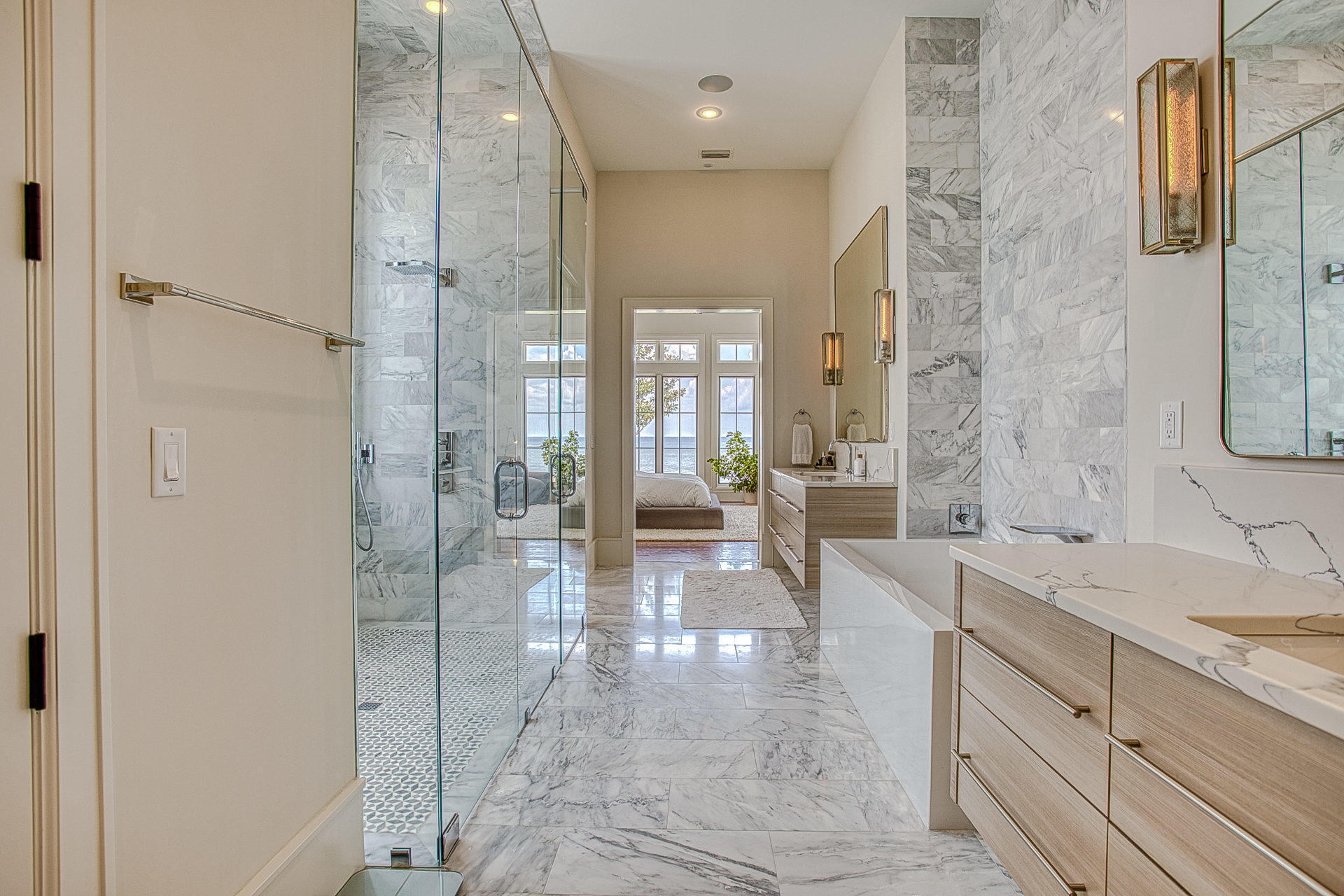 1023 Driftwood Point Road Santa Rosa Beach, FL 32459 - Photo 24 of 38 a large en suite bathroom with a granite countertop sink mirror and shower