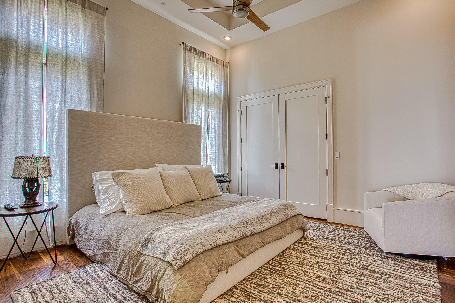 1023 Driftwood Point Road Santa Rosa Beach, FL 32459 - Photo 25 of 38 a bedroom with a bed and wooden floor