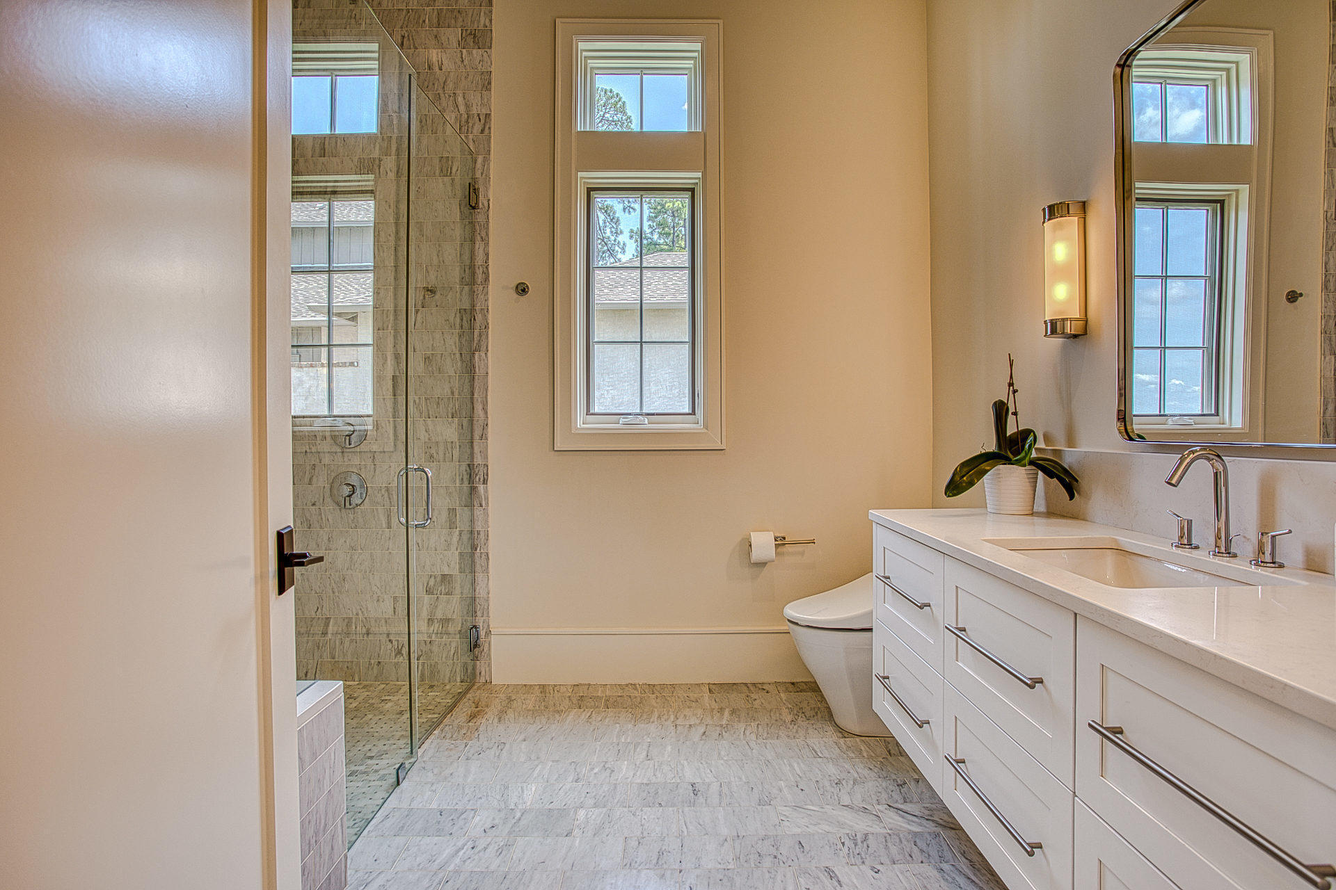 1023 Driftwood Point Road Santa Rosa Beach, FL 32459 - Photo 28 of 38 a bathroom with a double vanity sink a mirror and a shower