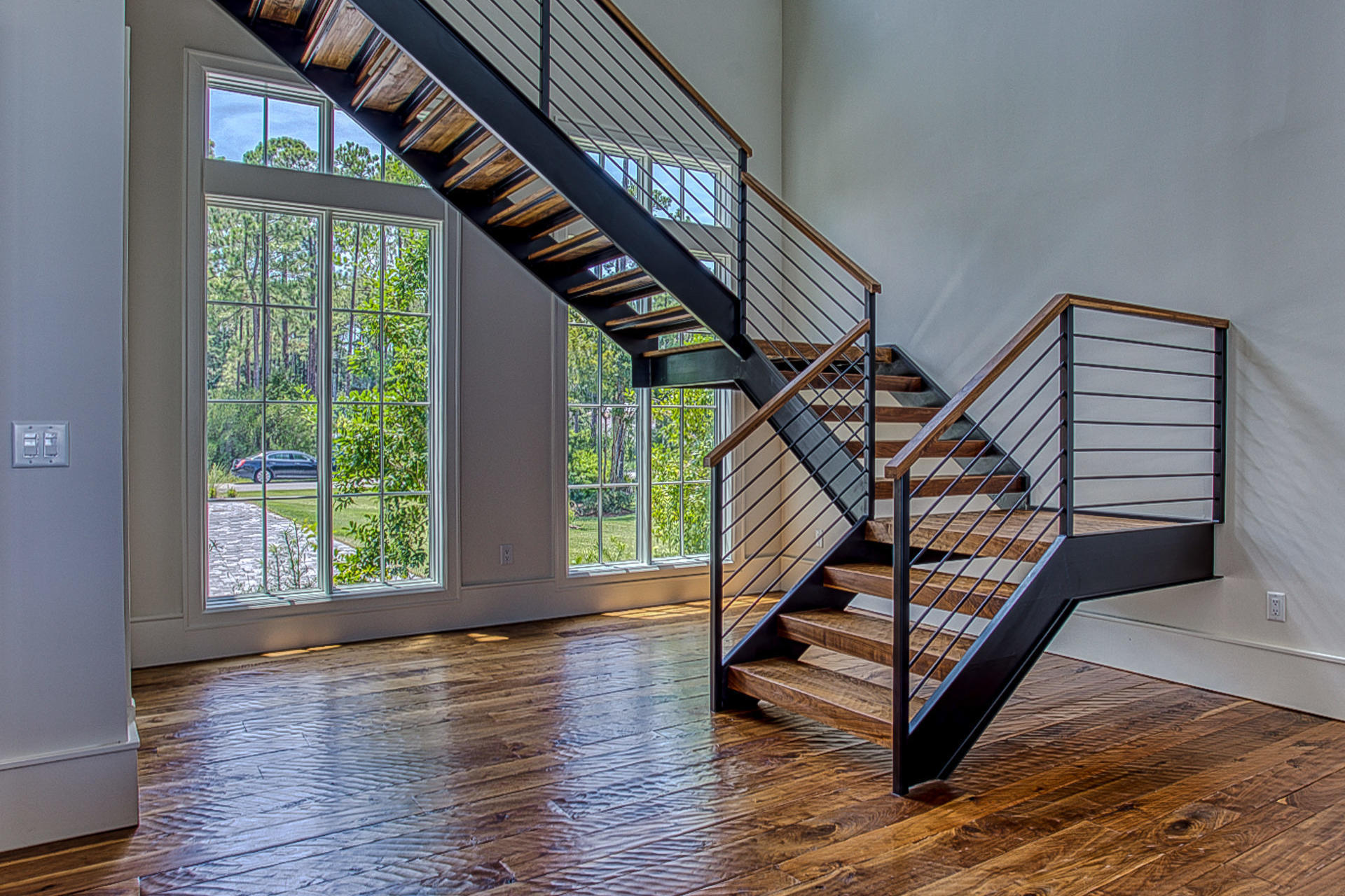 1023 Driftwood Point Road Santa Rosa Beach, FL 32459 - Photo 30 of 38 a view of entryway with wooden floor and stairs