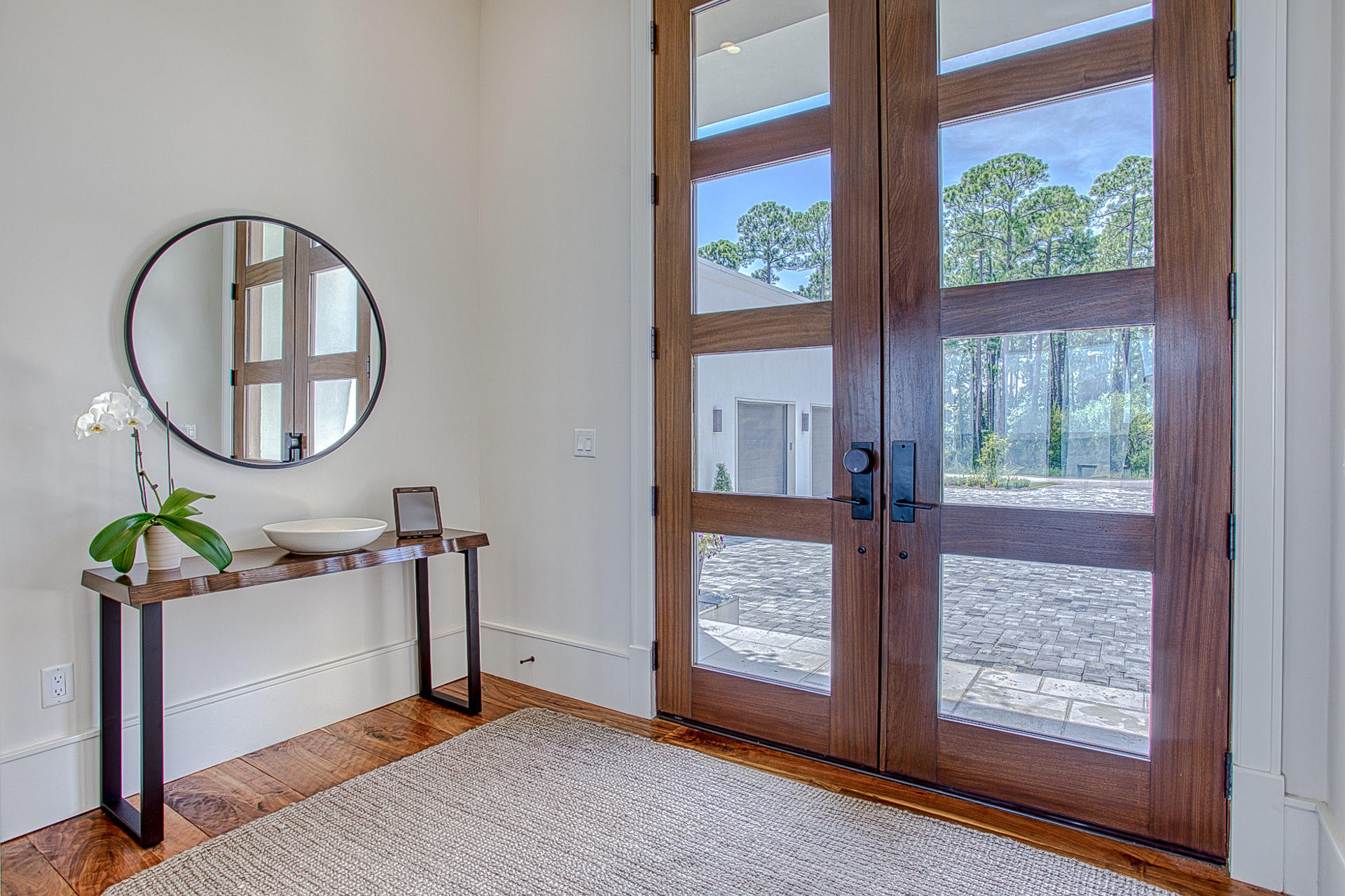 1023 Driftwood Point Road Santa Rosa Beach, FL 32459 - Photo 7 of 38 a view of a room that has a bed and a mirror