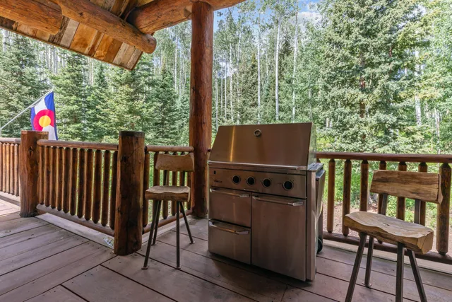 a view of balcony with wooden floor