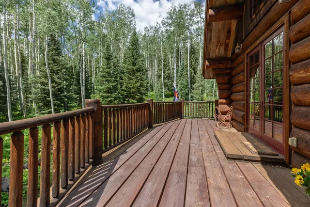 a view of balcony with wooden floor