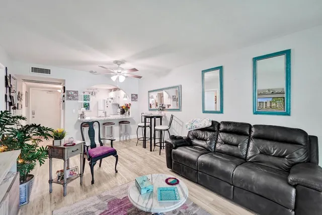 a bedroom with a bed and a table