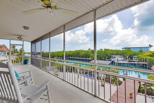 a view of balcony with furniture