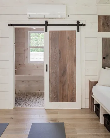 a view of a bathroom with a sink and a window