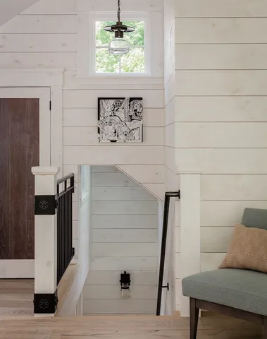 a view of hallway with furniture