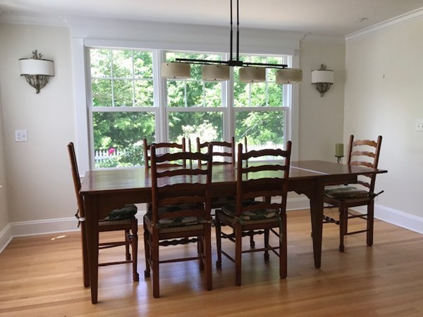 16 Pinecroft Road Weston, MA 02493 - Photo 4 of 18 a view of a dining room with furniture window and wooden floor