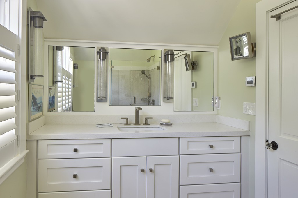 16 Pinecroft Road Weston, MA 02493 - Photo 9 of 18 a bathroom with a sink and a mirror