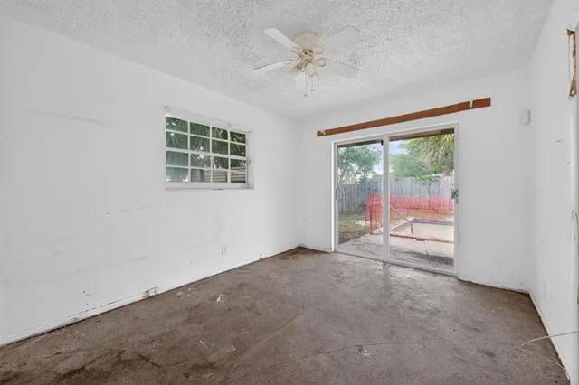 an empty room with windows