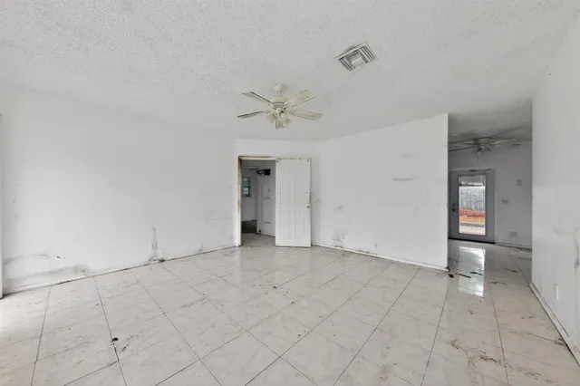 a kitchen with stainless steel appliances granite countertop a stove sink and cabinets