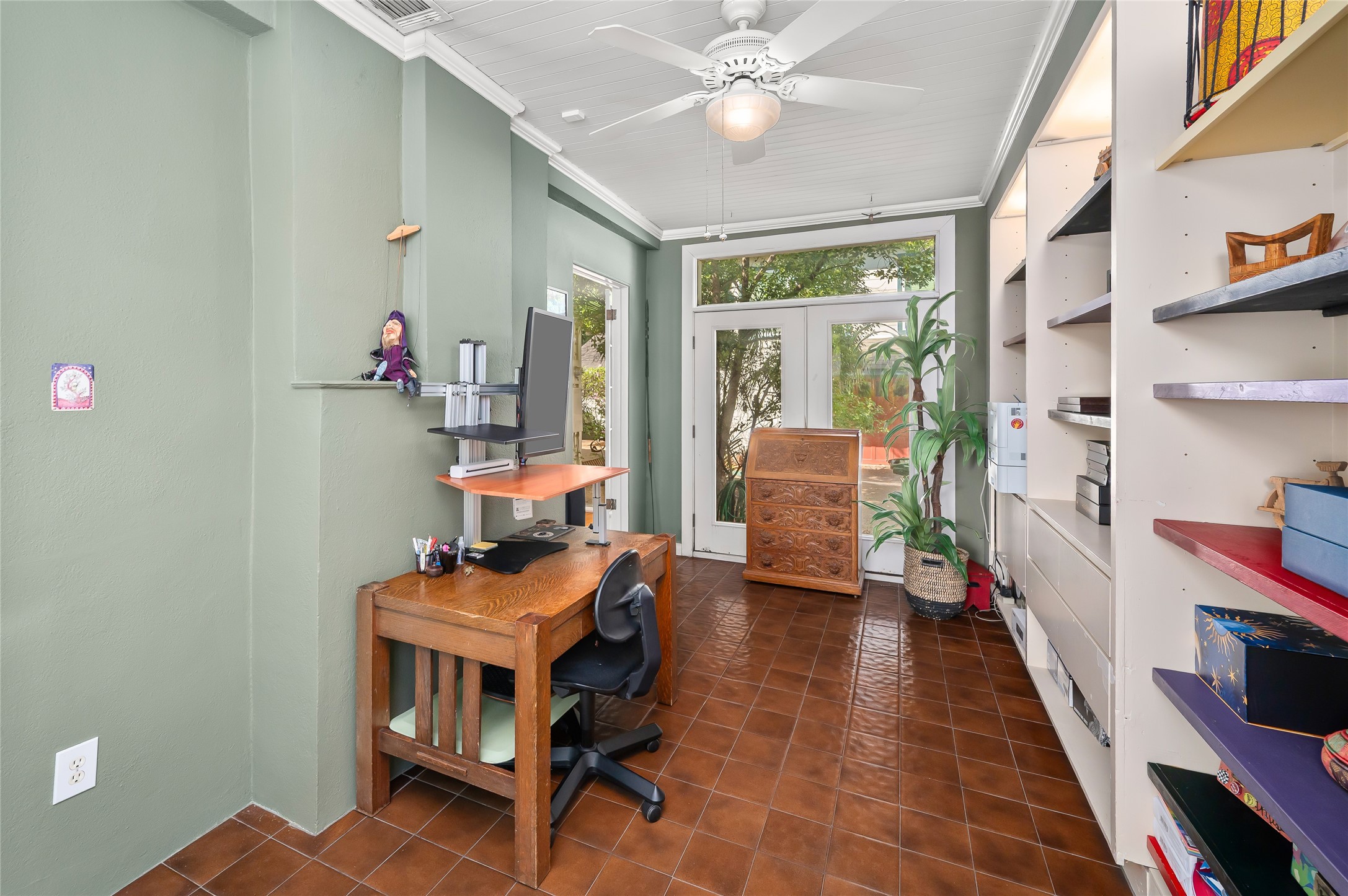 1534 Harold Street Houston, TX 77006 - Photo 11 of 41 a dining room with furniture and a chandelier