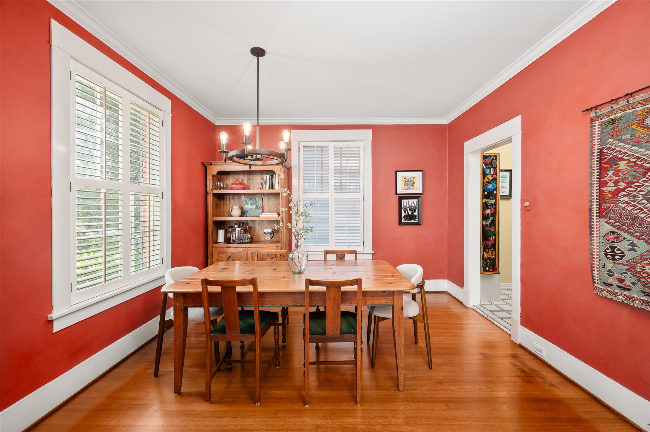 1534 Harold Street Houston, TX 77006 - Photo 12 of 41 a view of a dining room with furniture window and wooden floor