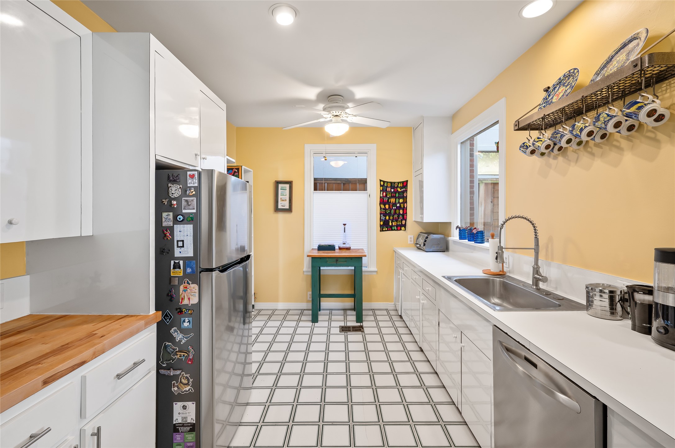 1534 Harold Street Houston, TX 77006 - Photo 14 of 41 a kitchen with a sink appliances and cabinets