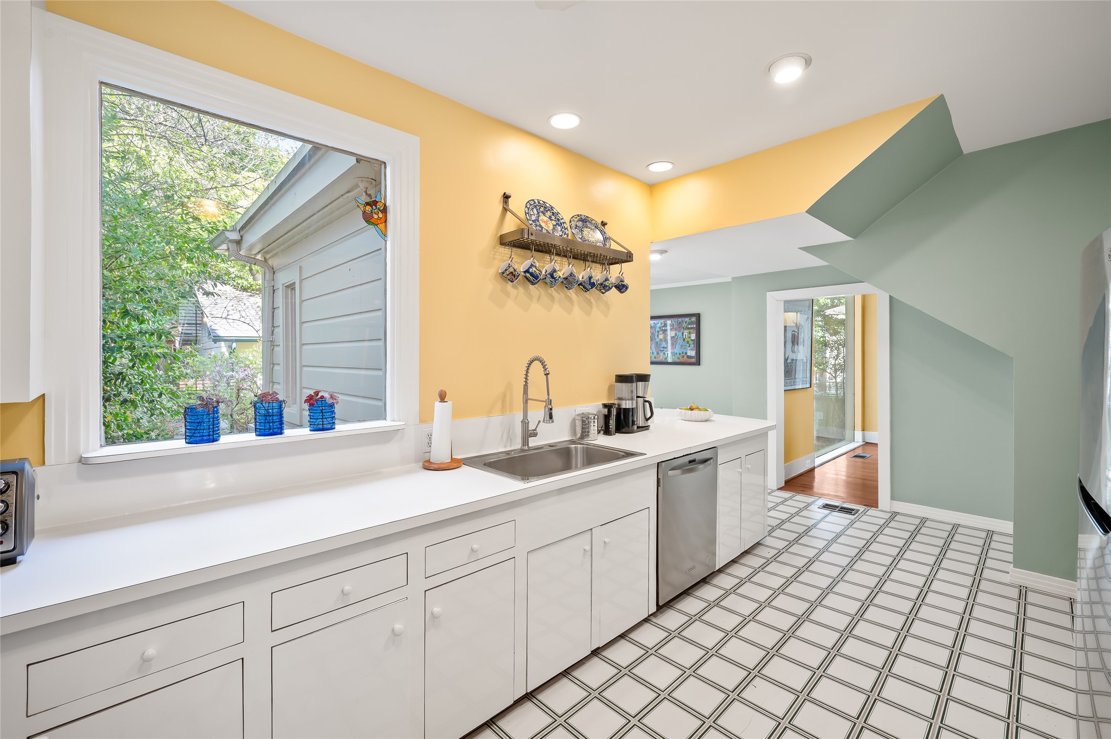 1534 Harold Street Houston, TX 77006 - Photo 15 of 41 a large white kitchen with a large window