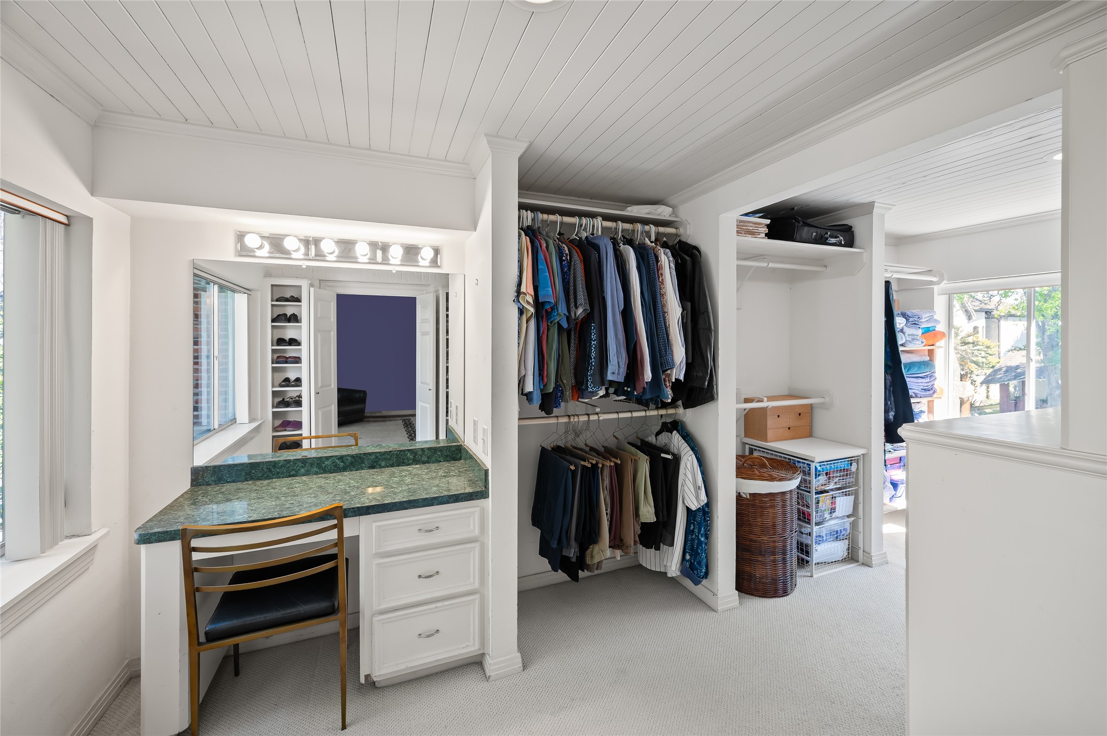 1534 Harold Street Houston, TX 77006 - Photo 28 of 41 a view of walk in closet with clothes and shoes