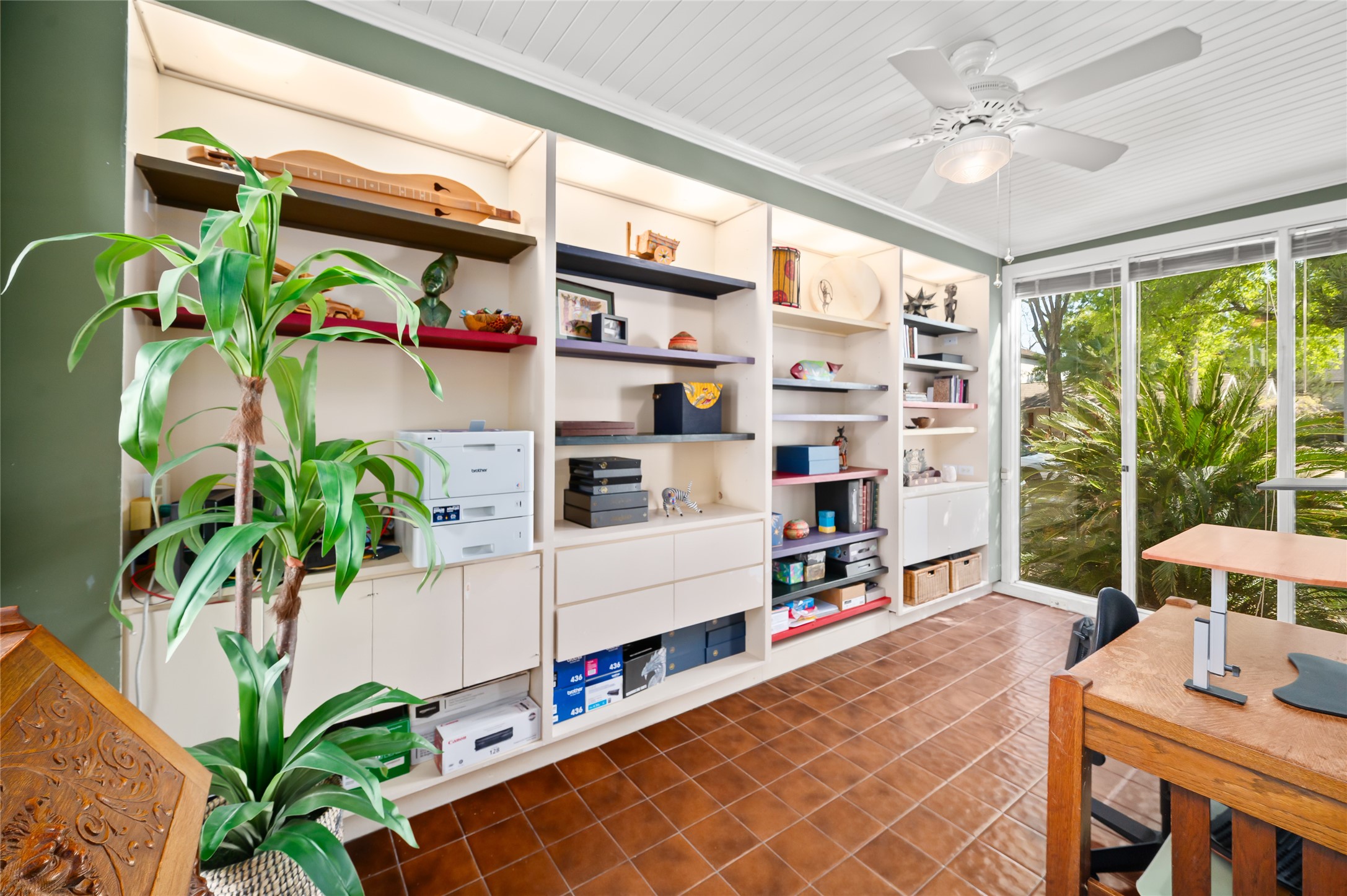 1534 Harold Street Houston, TX 77006 - Photo 5 of 41 a living room filled with furniture potted plant and a large window