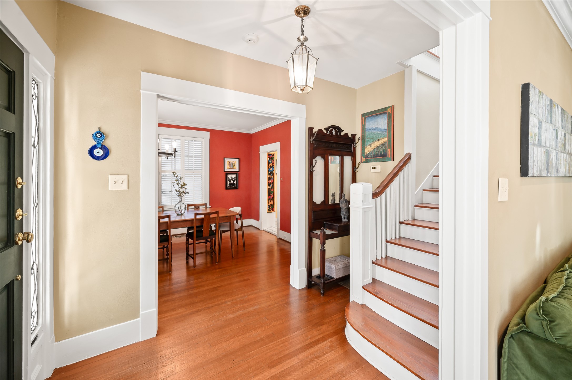 1534 Harold Street Houston, TX 77006 - Photo 8 of 41 a view of a hallway with furniture and wooden floor