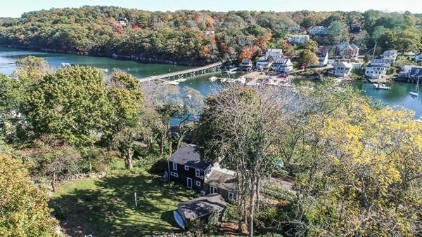 50 River Road Gloucester, MA 01930 - Photo 13 of 33 a view of a lake with houses