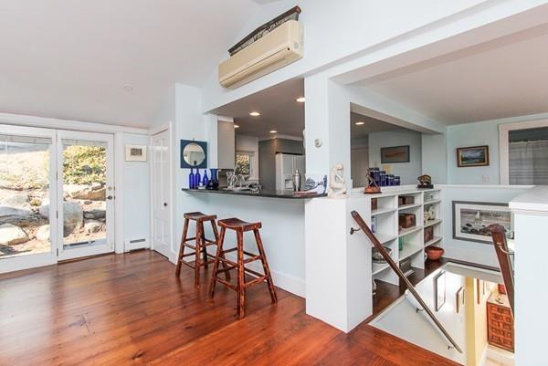 50 River Road Gloucester, MA 01930 - Photo 8 of 33 a view of a dining room with furniture and wooden floor