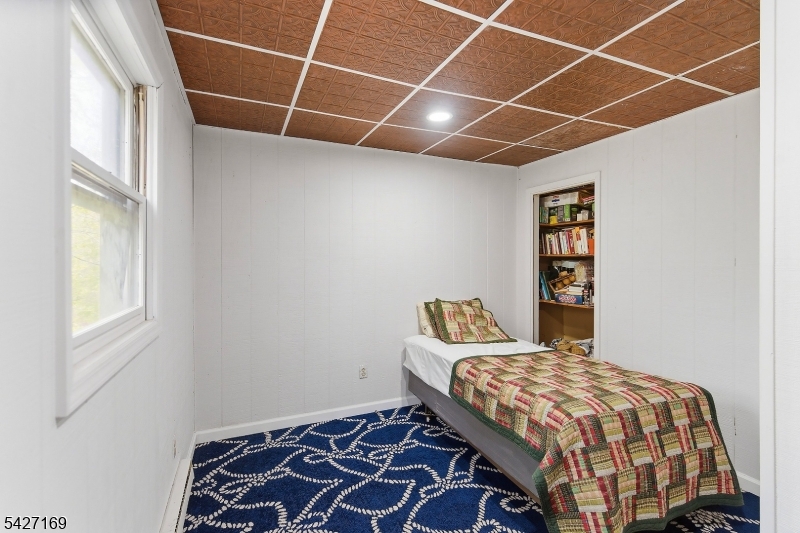 41 Crescent Drive South Andover, NJ 07821 - Photo 24 of 29 a bedroom with a bed and a window