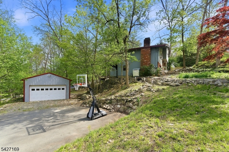 41 Crescent Drive South Andover, NJ 07821 - Photo 27 of 29 a view of a house with a yard and sitting area