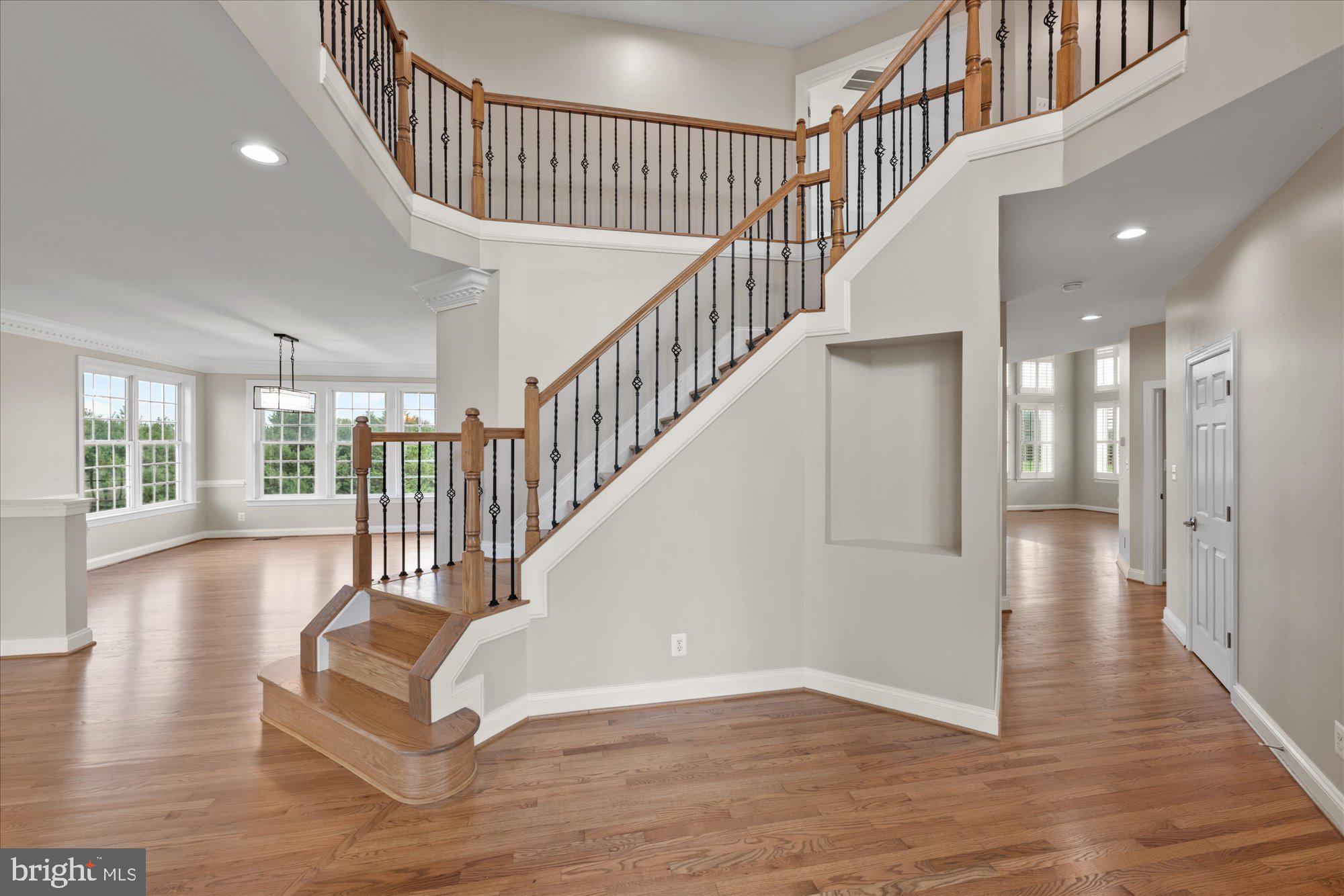 Dramatic Staircase with Iron Balusters