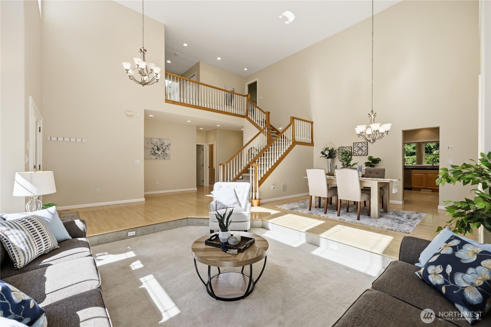 4354 Northwest Westgate Road Silverdale, WA 98383 - Photo 5 of 40 a living room with furniture and a chandelier