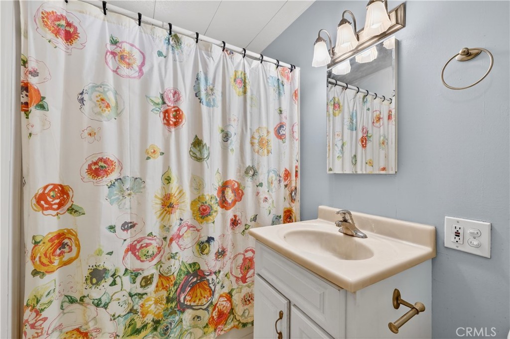 1001 West Lambert Road, Unit 258 La Habra, CA 90631 - Photo 29 of 75 a bathroom with a sink and a mirror