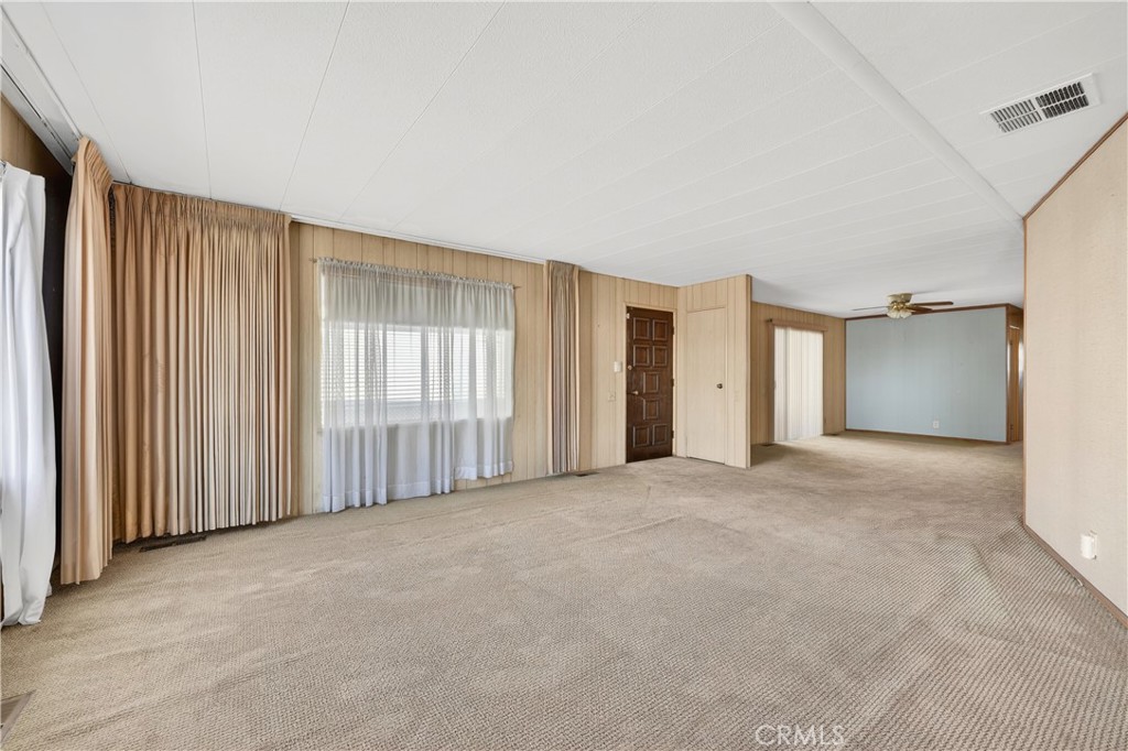 1001 West Lambert Road, Unit 258 La Habra, CA 90631 - Photo 4 of 75 an empty room with windows