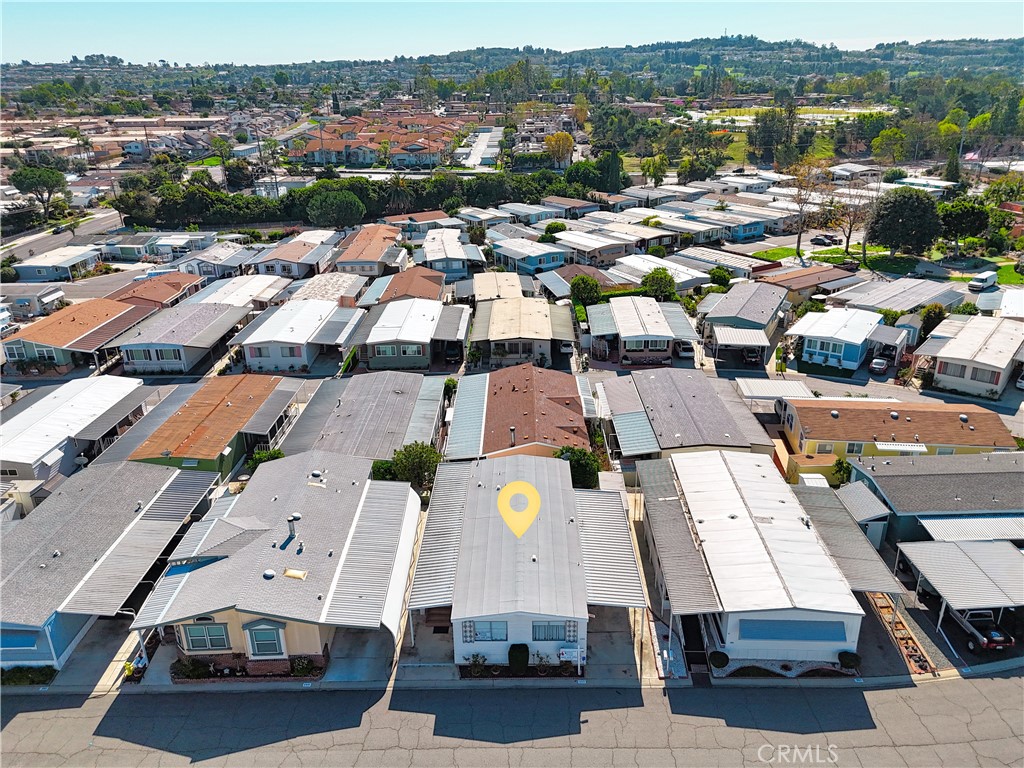 1001 West Lambert Road, Unit 258 La Habra, CA 90631 - Photo 41 of 75 an aerial view of a city with lots of residential buildings