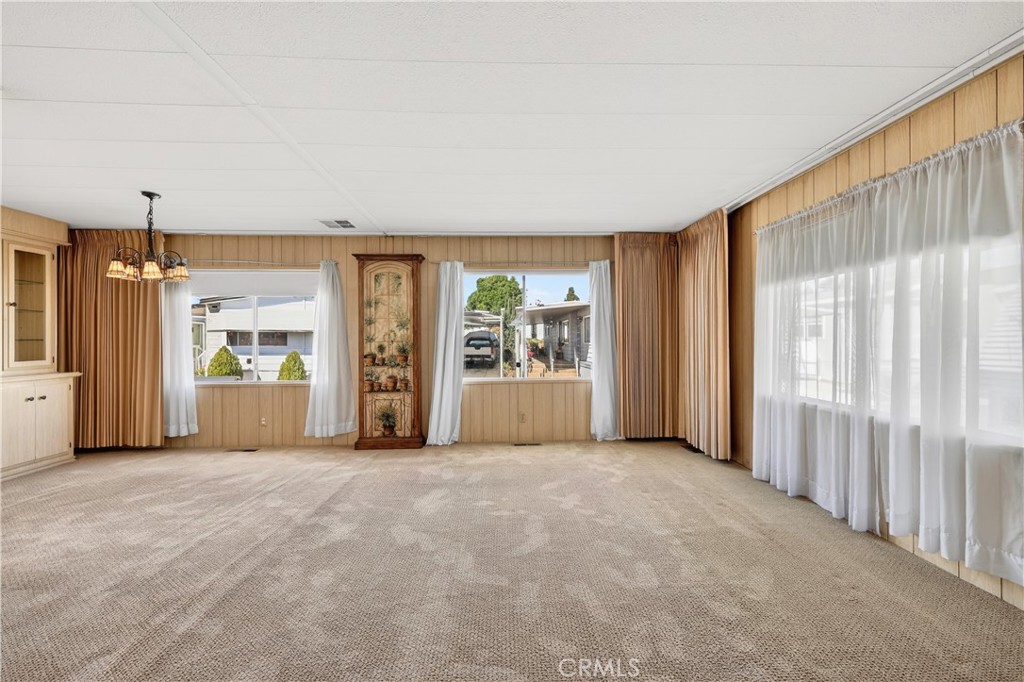 1001 West Lambert Road, Unit 258 La Habra, CA 90631 - Photo 6 of 75 a view of an empty room with a window