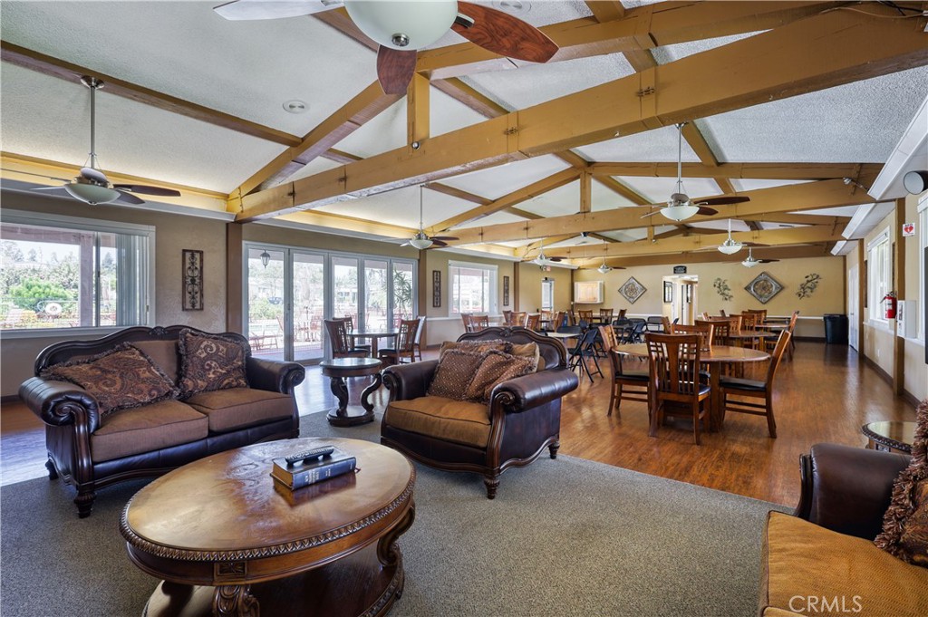 1001 West Lambert Road, Unit 258 La Habra, CA 90631 - Photo 71 of 75 a living room with furniture and a dining table